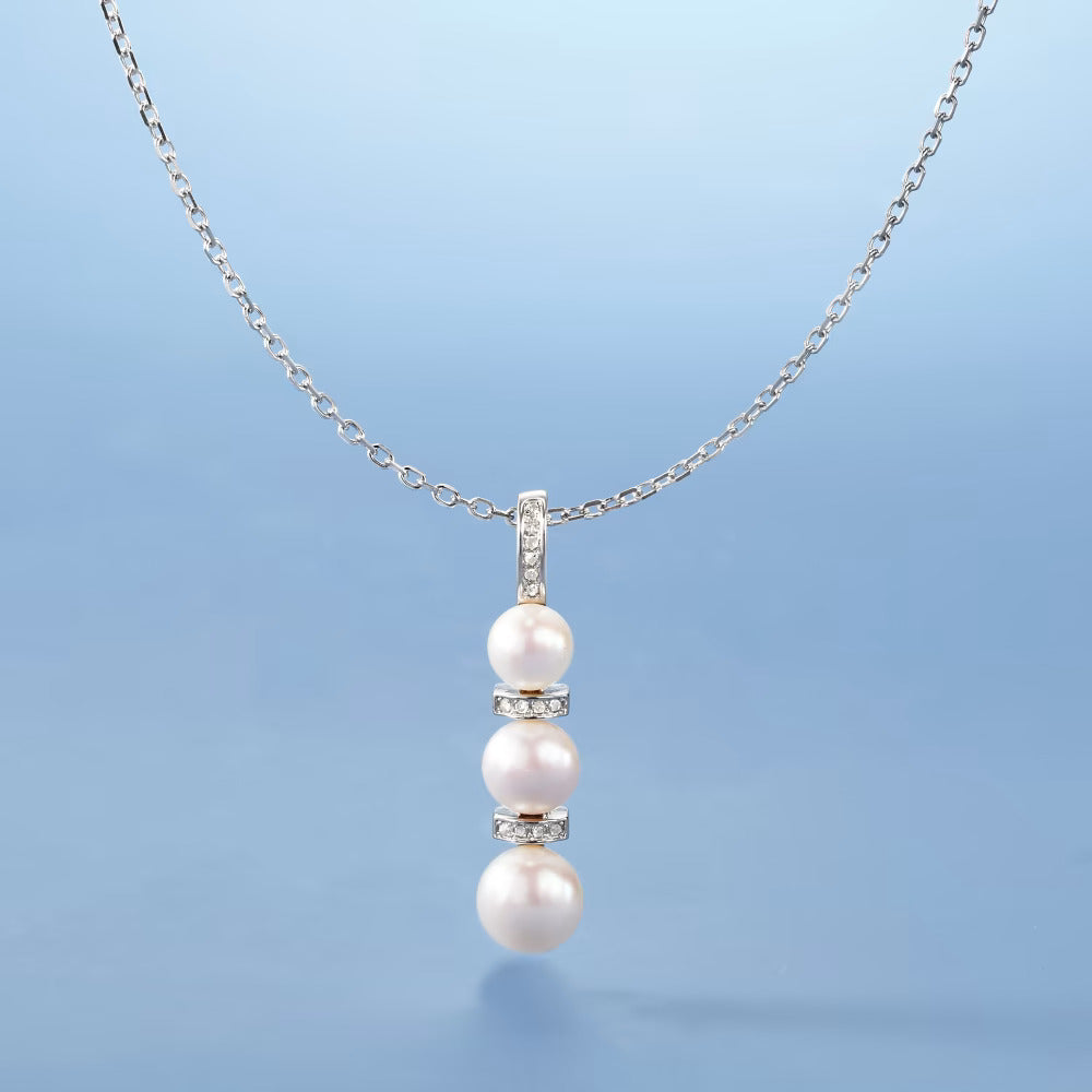 6-8.5mm Cultured Pearl and .10 ct. t.w. Diamond Pendant Necklace in Sterling Silver. 18"